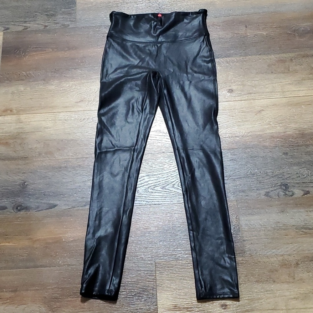 Spanx black oil slick stretch workout leggings